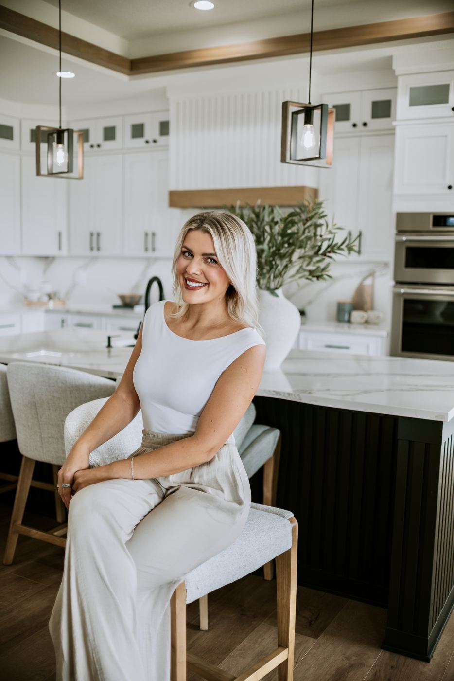Senada in a white designer kitchen